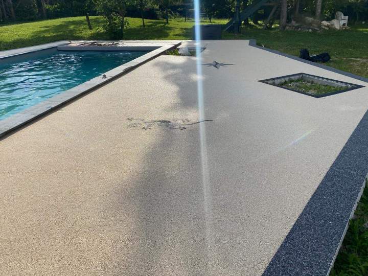 Résine drainante et moquette de pierre