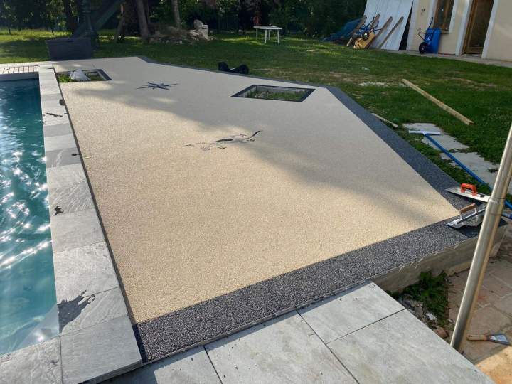 Résine drainante et moquette de pierre